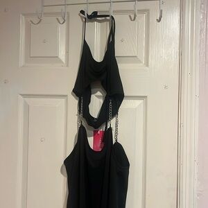 BLACK DRESS, size M has an amazing metal detail, very original style